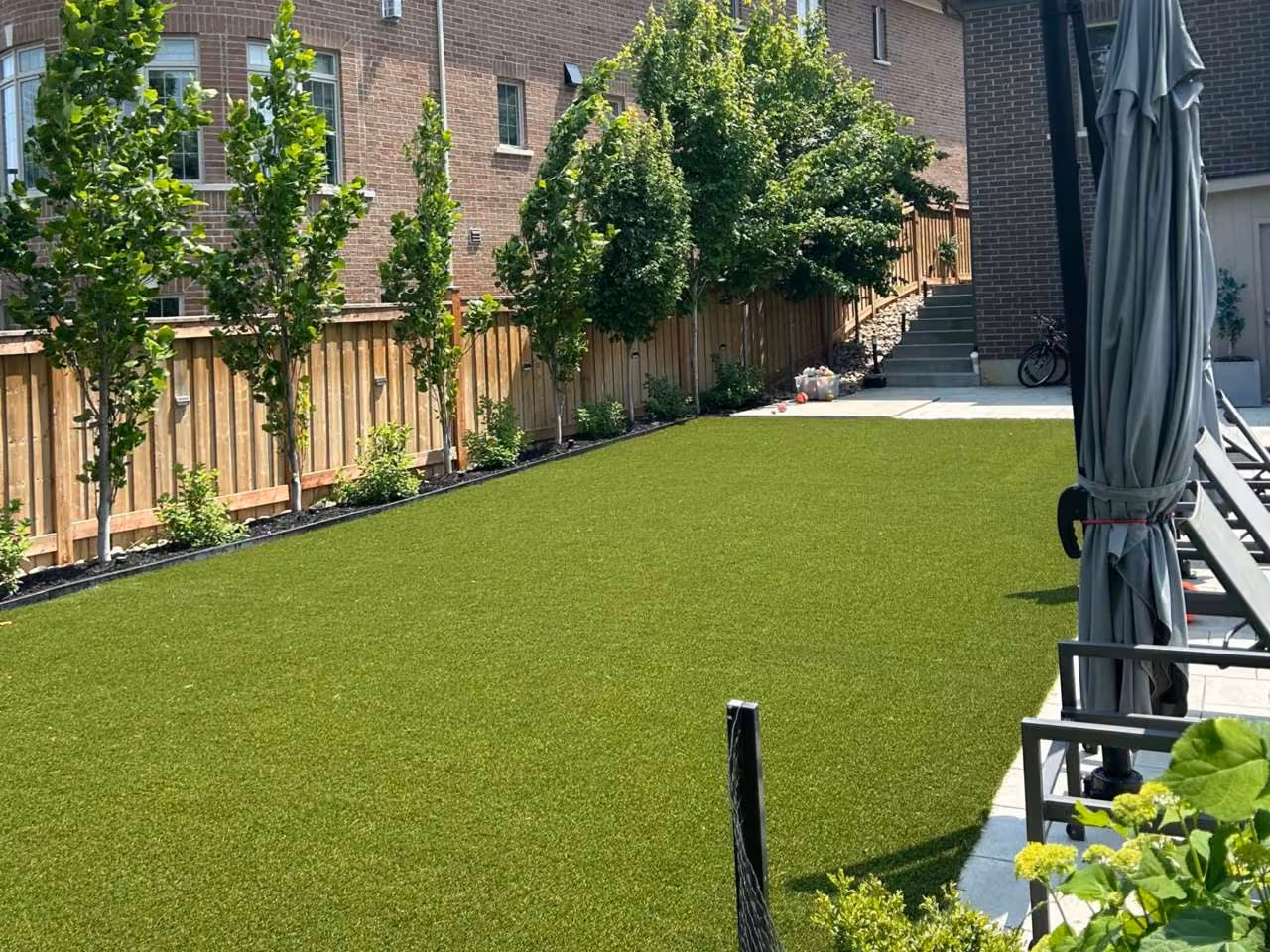 Artificial turf around a pool